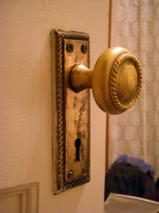 closeup of doorknob that looks like a face